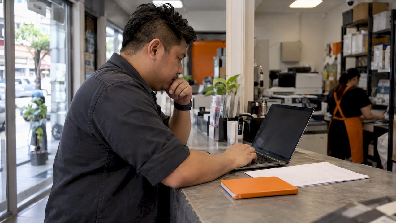 SME owner comparing automation platform options